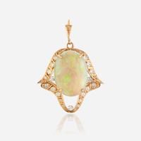 An opal, diamond, and gold pendant