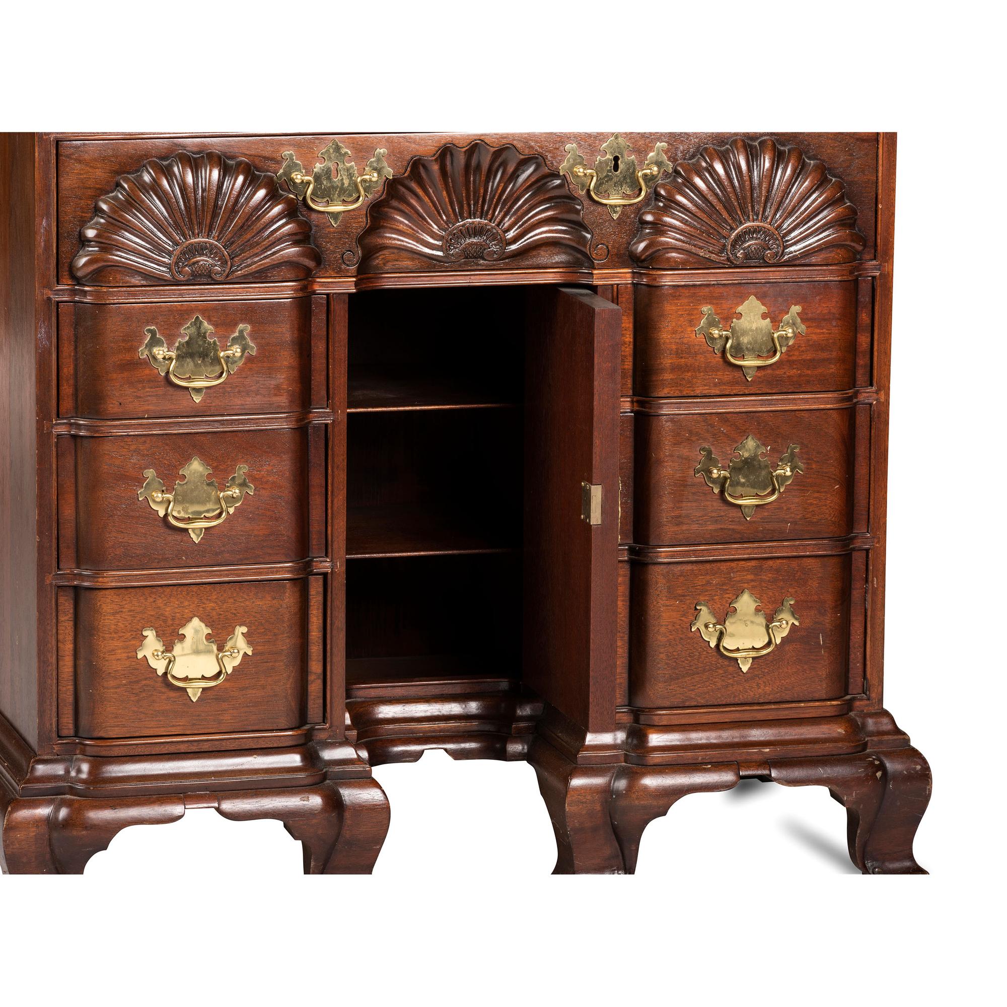 A Chippendale Style Shell-and-Block Carved Mahogany Kneehole Dressing Table