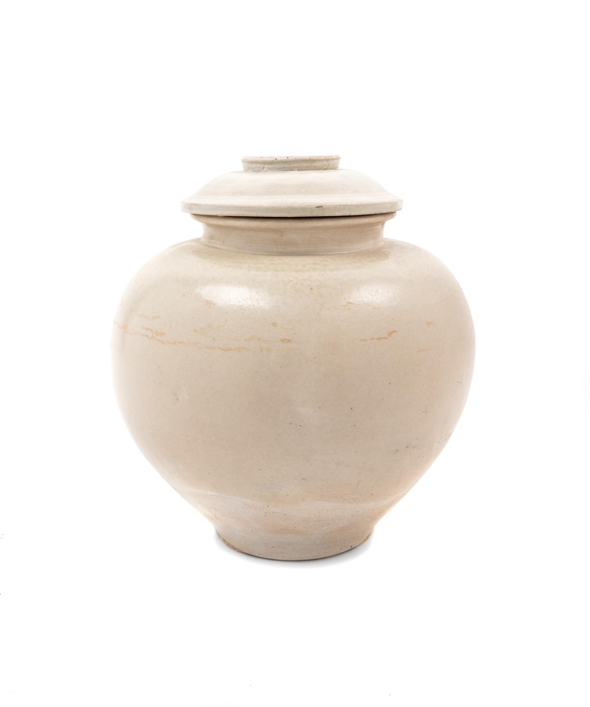 A Glazed White Ware Jar and Cover Height 8 1/2 inches. — TANG DYNASTY (618-907 C.E.)