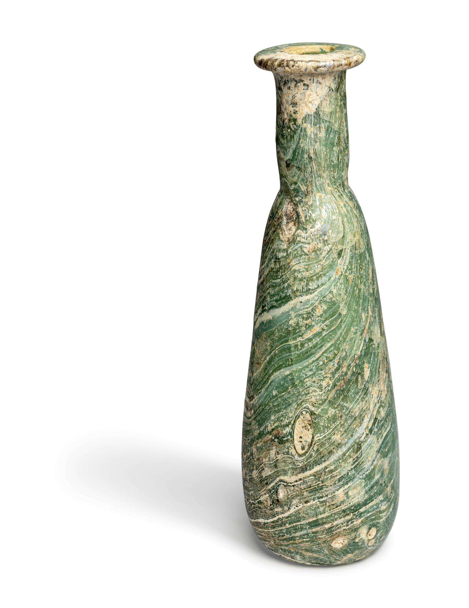 A Large Roman Marbled Glass Bottle