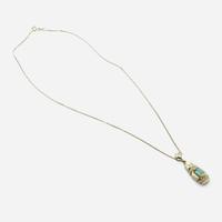 An 18K, yellow gold, and tourmaline necklace