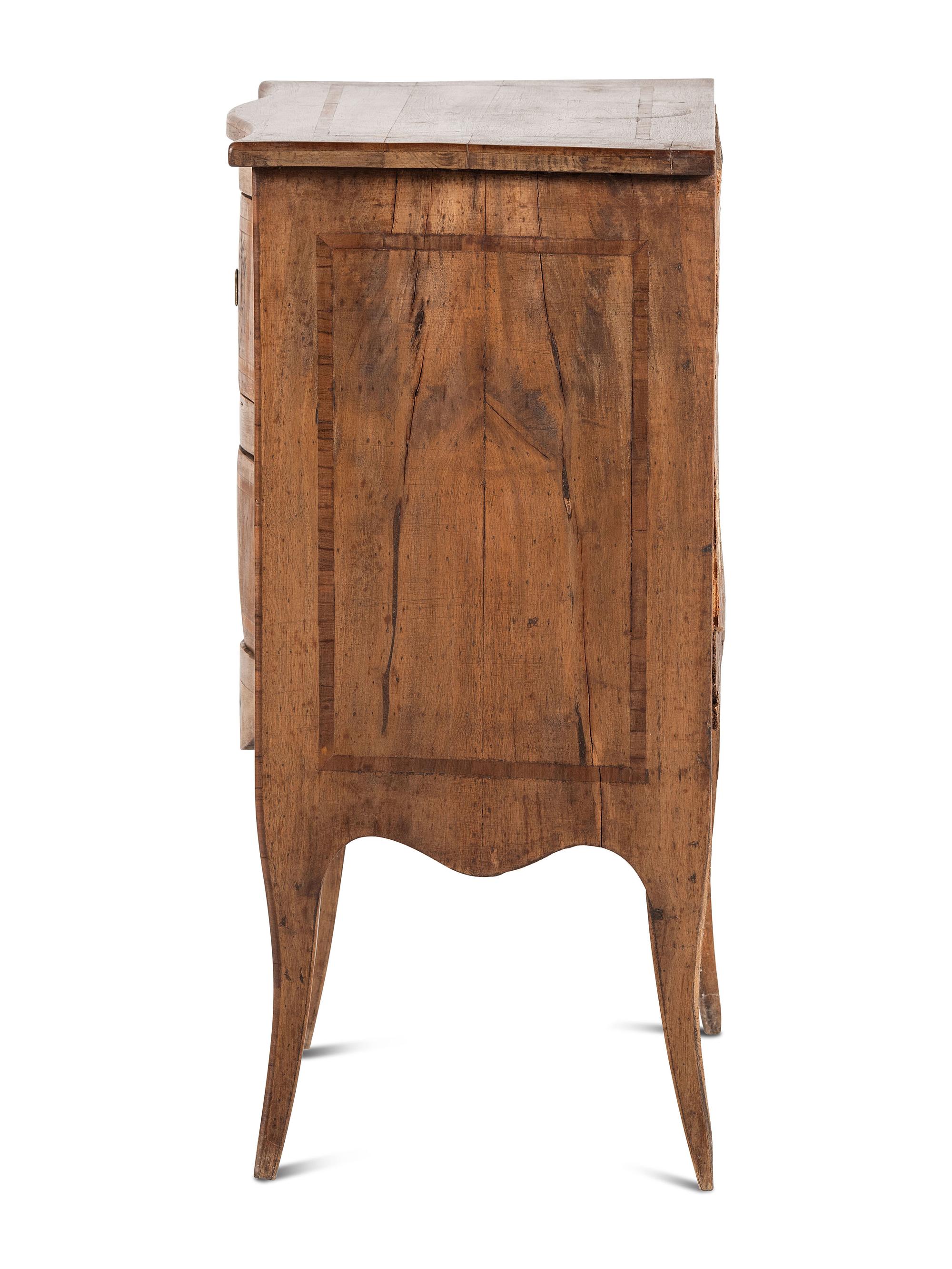 An Inlaid Walnut Commode