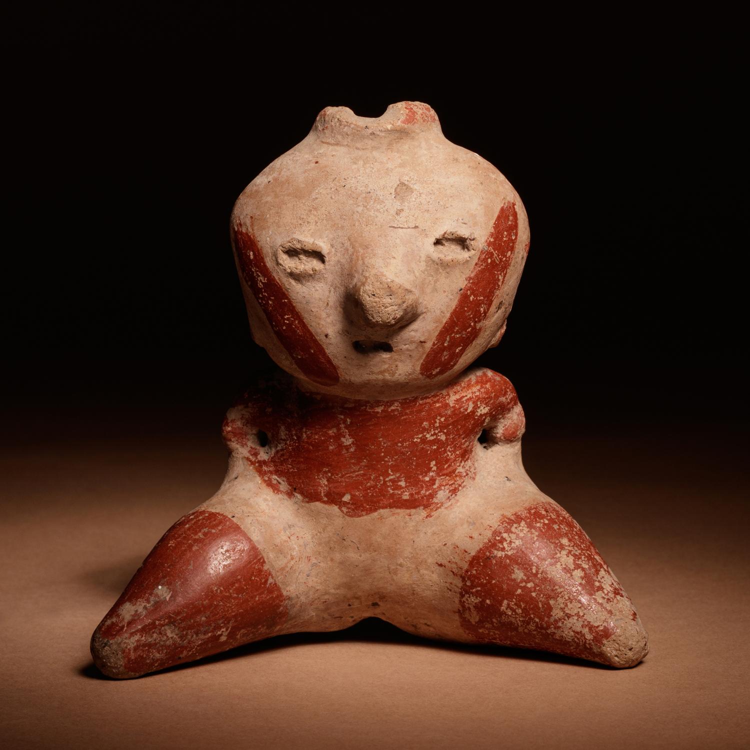 A Nayarit Terracotta Seated Figure