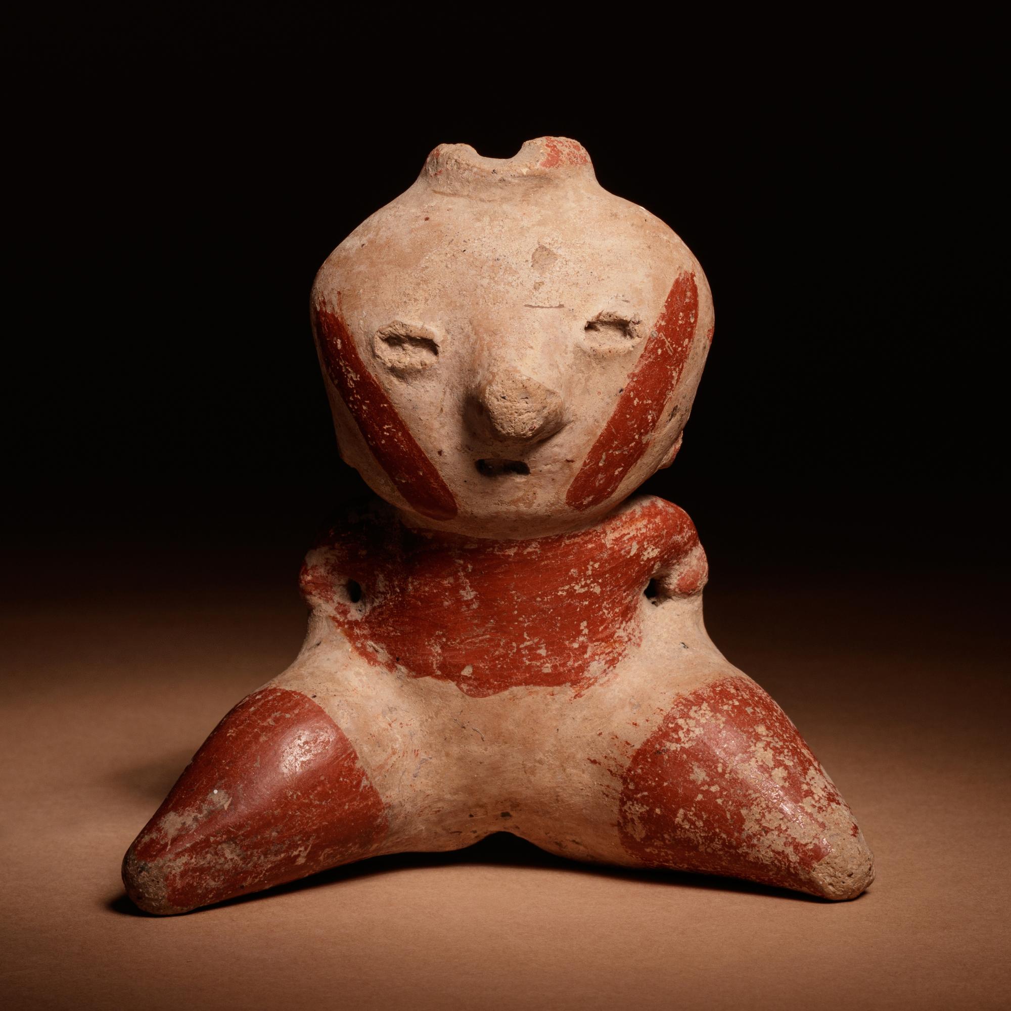 A Nayarit Terracotta Seated Figure