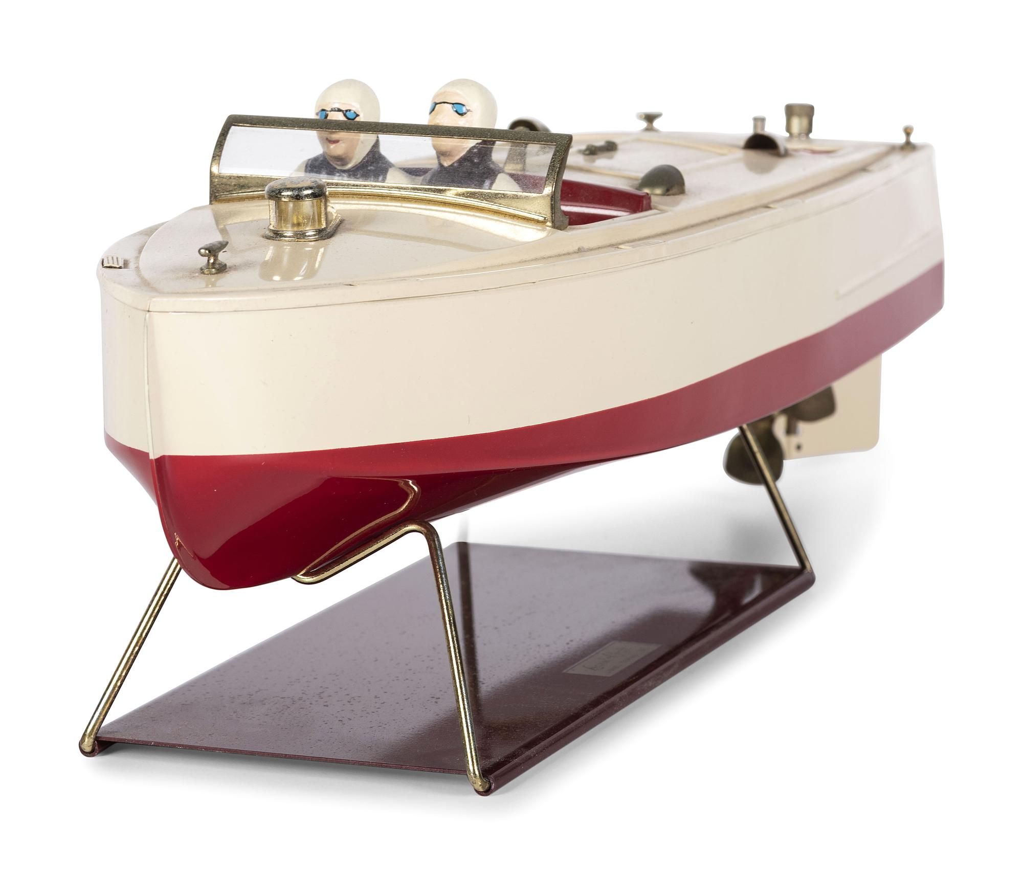 A Lionel Craft Wind Up Tin Boat