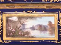 A Sèvres Style Painted and Parcel Gilt Porcelain Table Casket