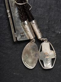 Sterling Silver and Cobblestone Inlay Figural Bolo Tie