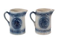 A Pair of Salt Glaze Stoneware Eagle and Bird Pitchers