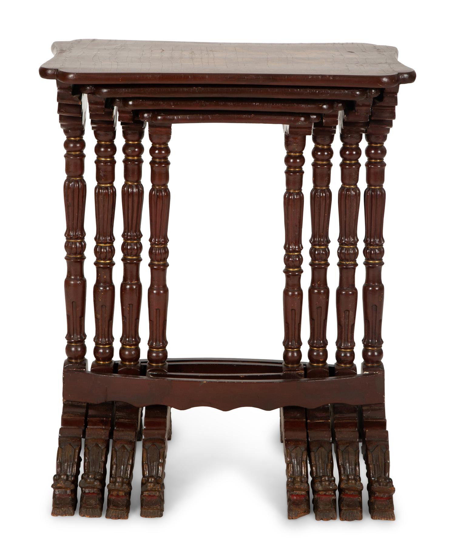 A Set of Four Chinese Lacquered Nesting Tables