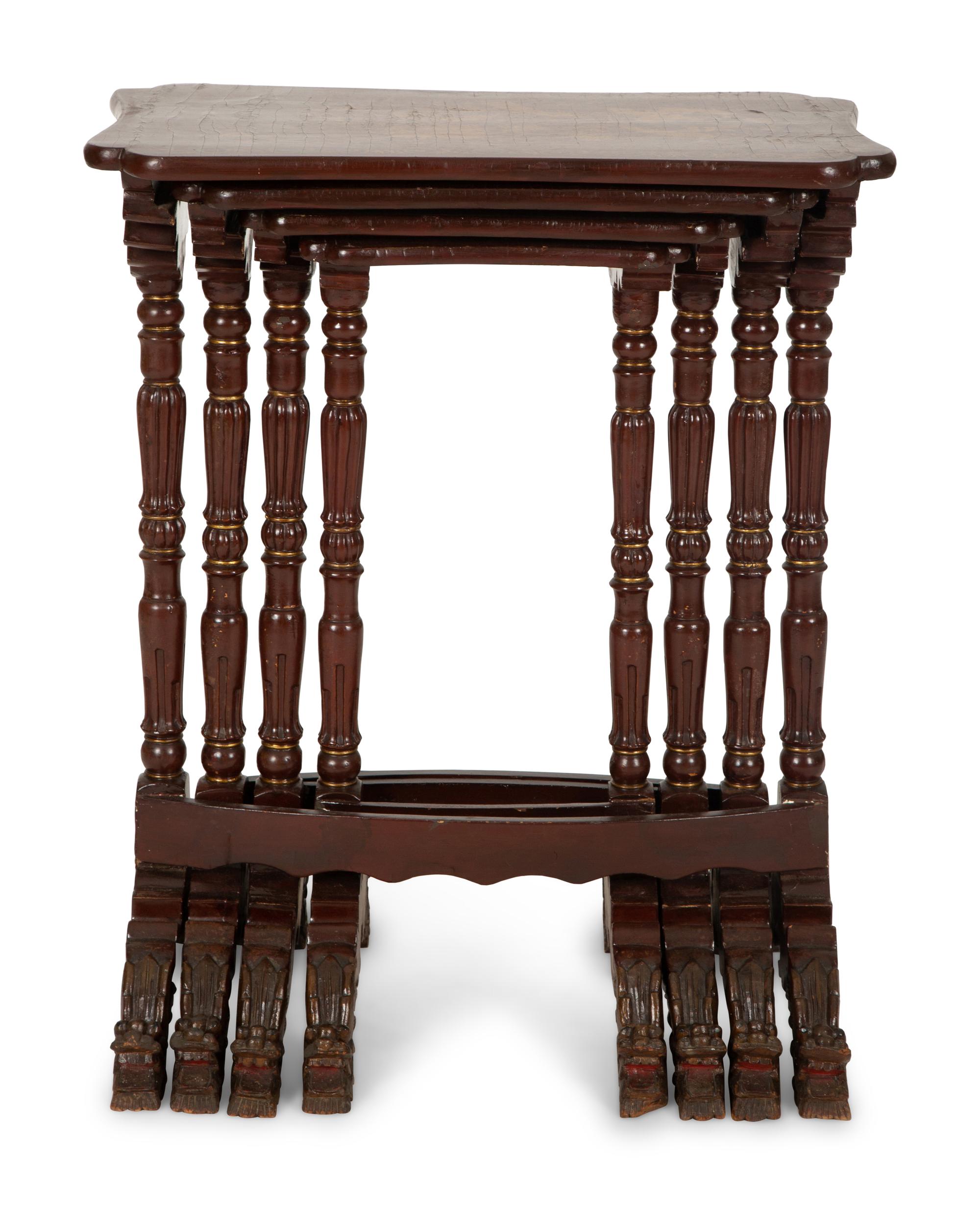 A Set of Four Chinese Lacquered Nesting Tables
