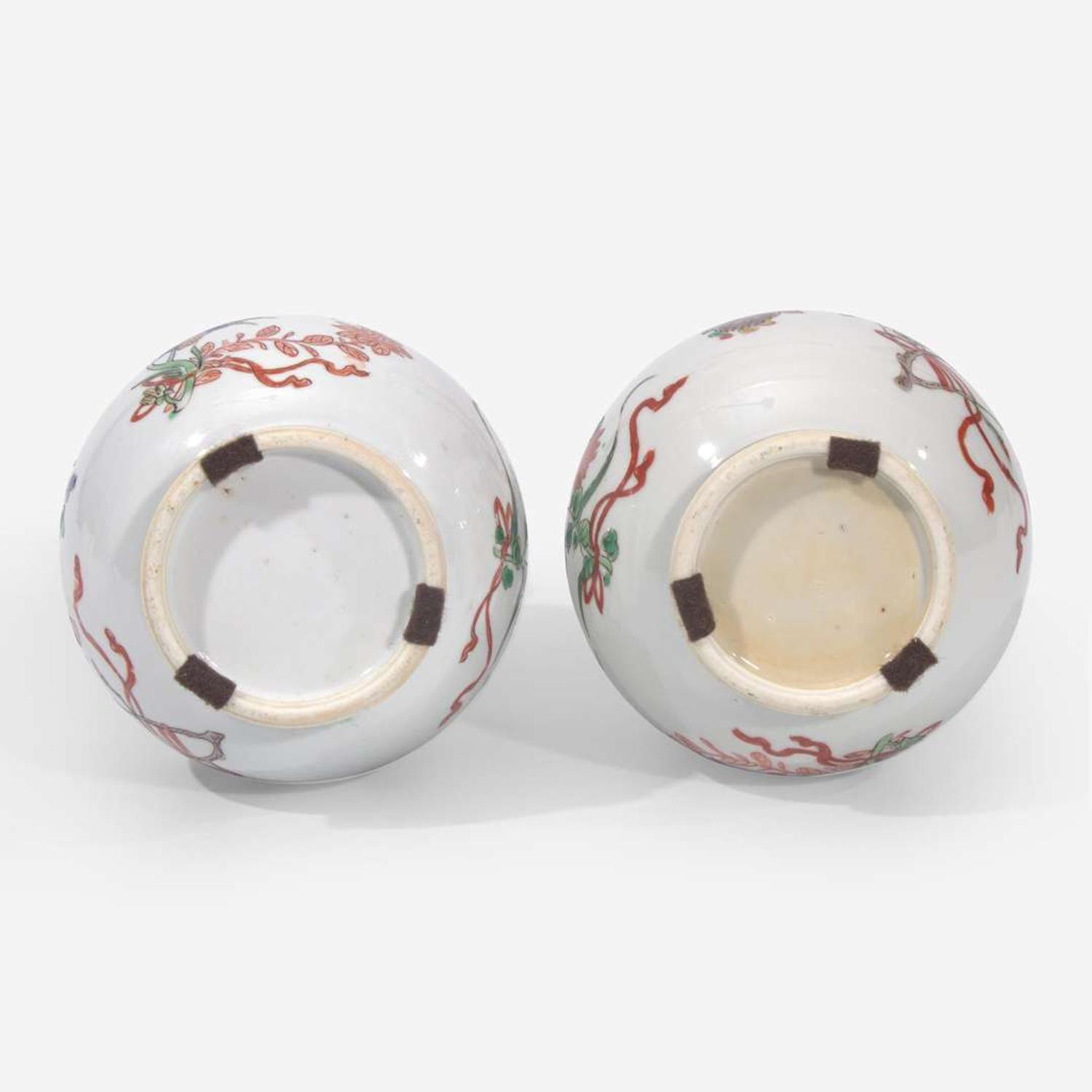 A pair of Chinese famille verte-decorated porcelain triple-gourd vases 五彩三层葫芦形瓶一对 Kangxi period ???