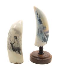 Two Contemporary Scrimshaw Whale Teeth, Height of first 6 inches.