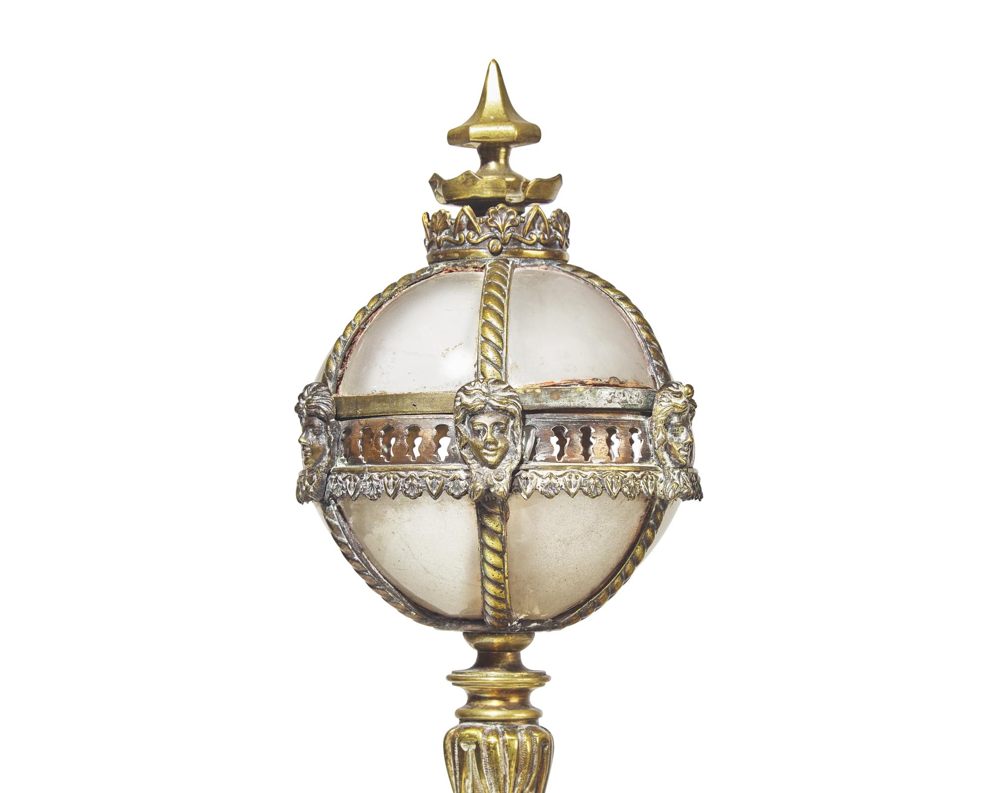 A pair of Belle Epoque gilt bronze and walnut table lamps in the form of miniature street lamps, late 19th century