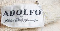 An Adolfo Cream, Gold and Navy Knit Skirt Ensemble, No size. Handbag: 8.5'' x 6''; Strap drop: 10.5''.