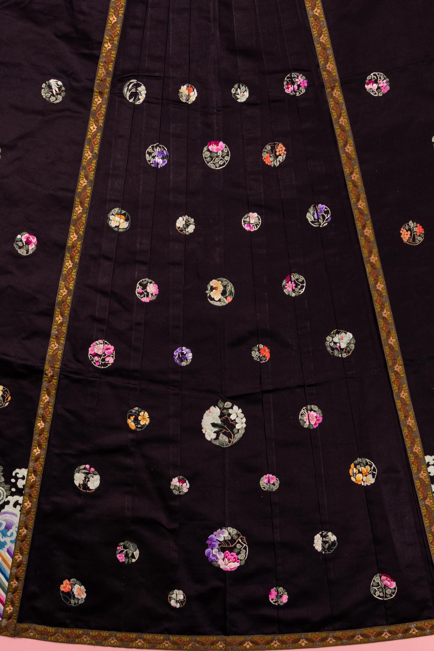 A Set of Aubergine Satin Ground Embroidered Silk Lady's Robe and Skirt