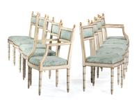 A Set of Ten Italian Painted and Parcel Gilt Dining Chairs with Fortuny Upholstery