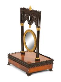 A Charles X Gothic-Motif Patinated, Gilt Bronze and Satinwood Dressing Mirror