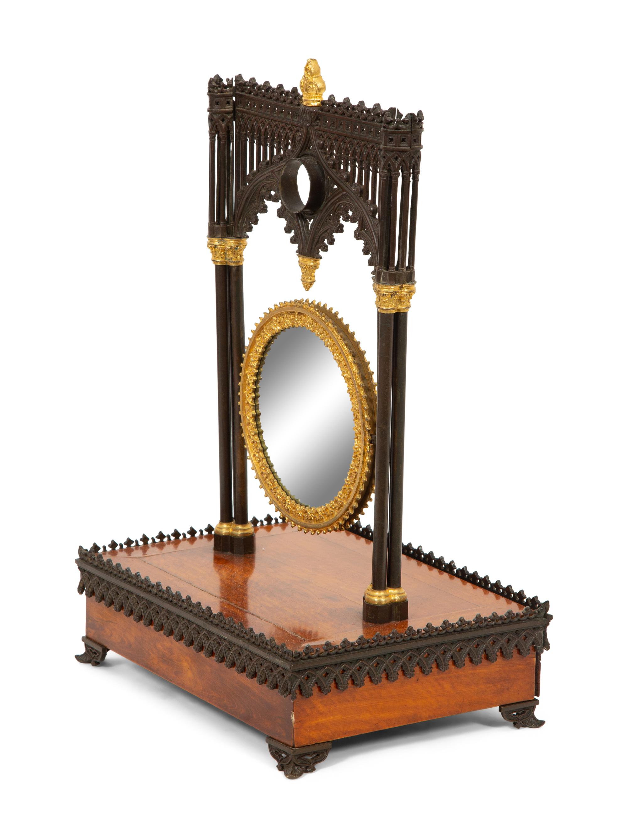 A Charles X Gothic-Motif Patinated, Gilt Bronze and Satinwood Dressing Mirror