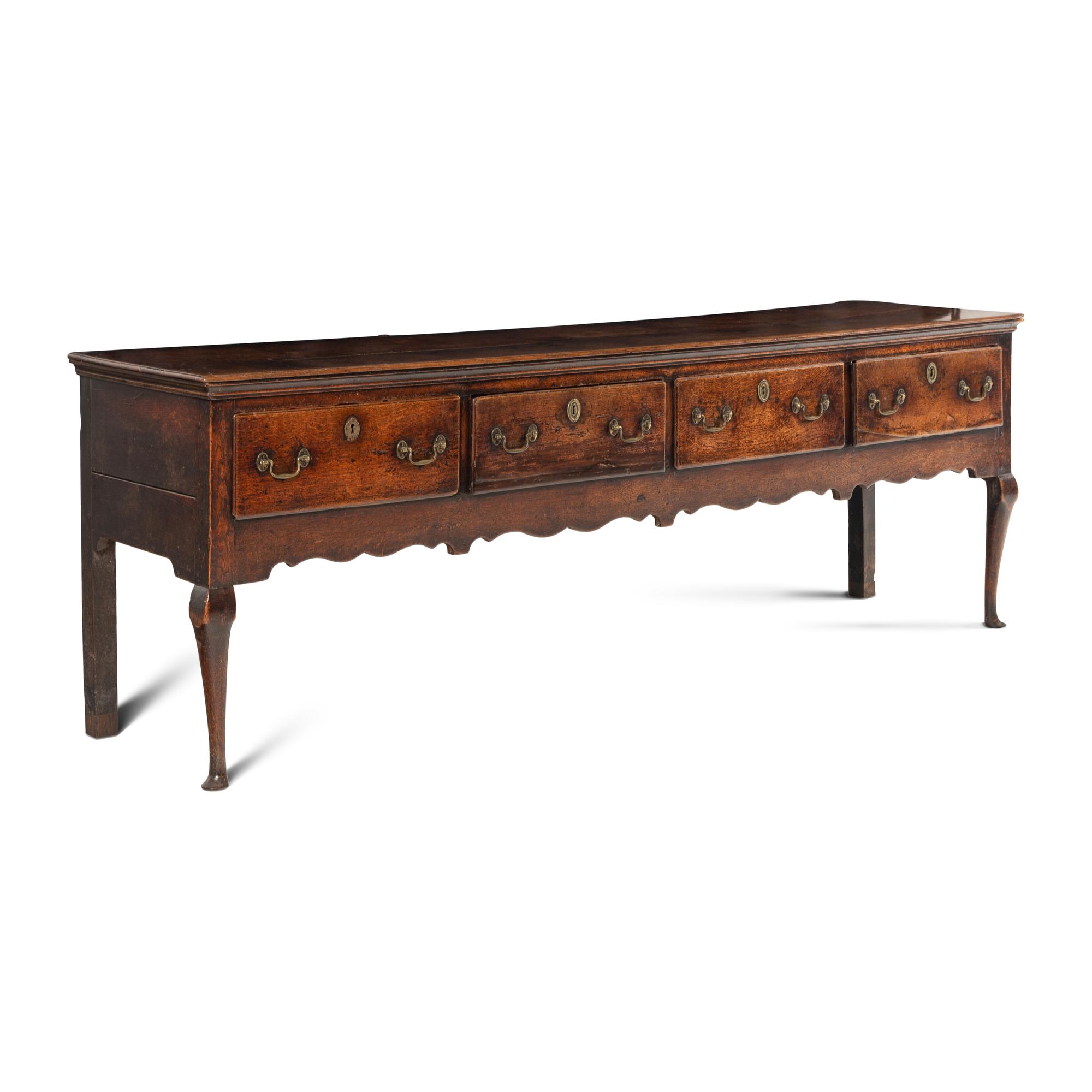 A Queen Anne Oak Four-Drawer Dresser