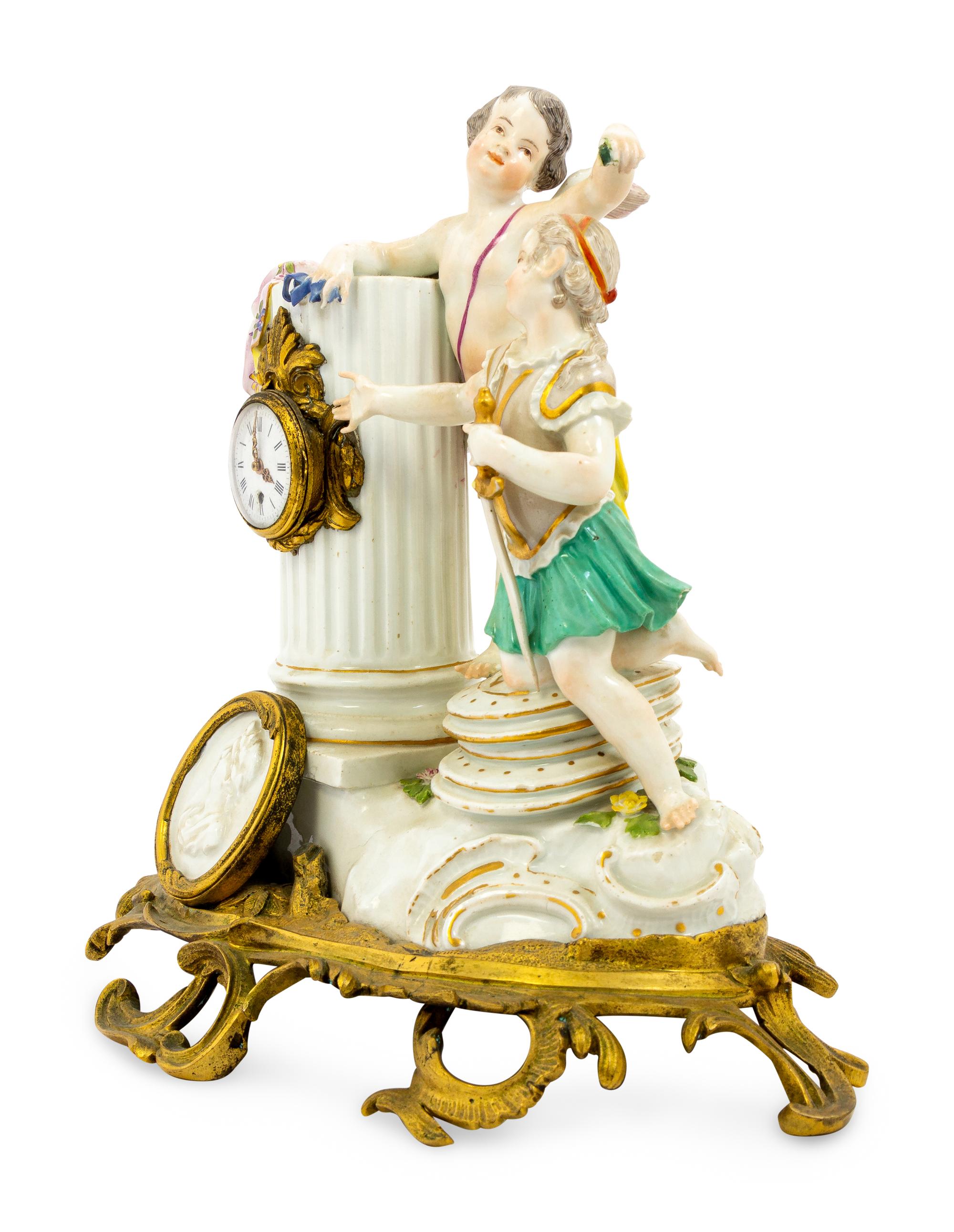 A Meissen Porcelain Figural Mantel Clock