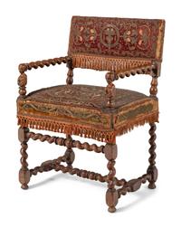 A Set of Four Baroque Revival Walnut Armchairs