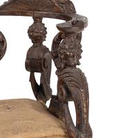 An Italian Carved Walnut Tête-à-Tête