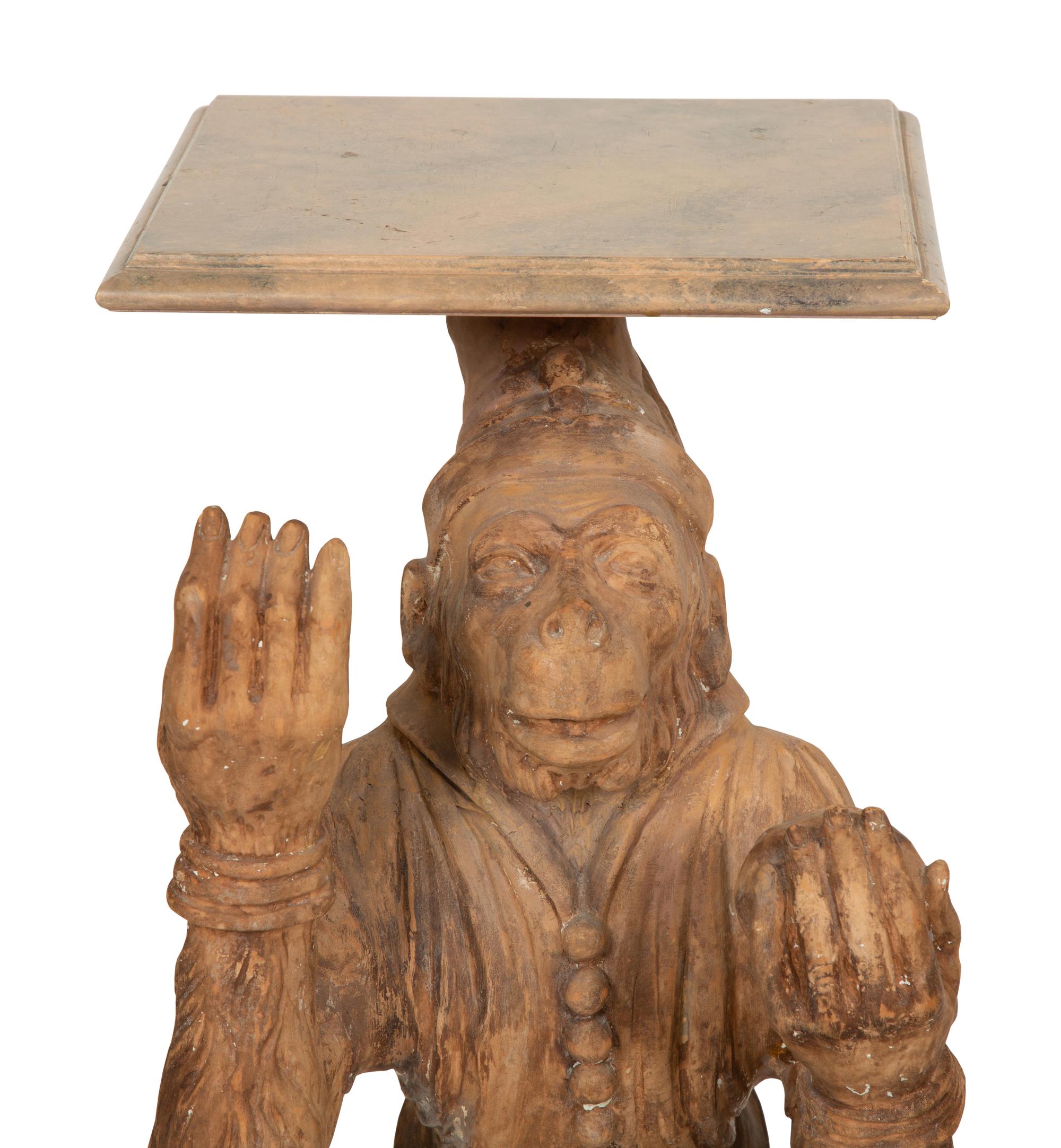 A Pair of Terra Cotta Monkey Pedestals