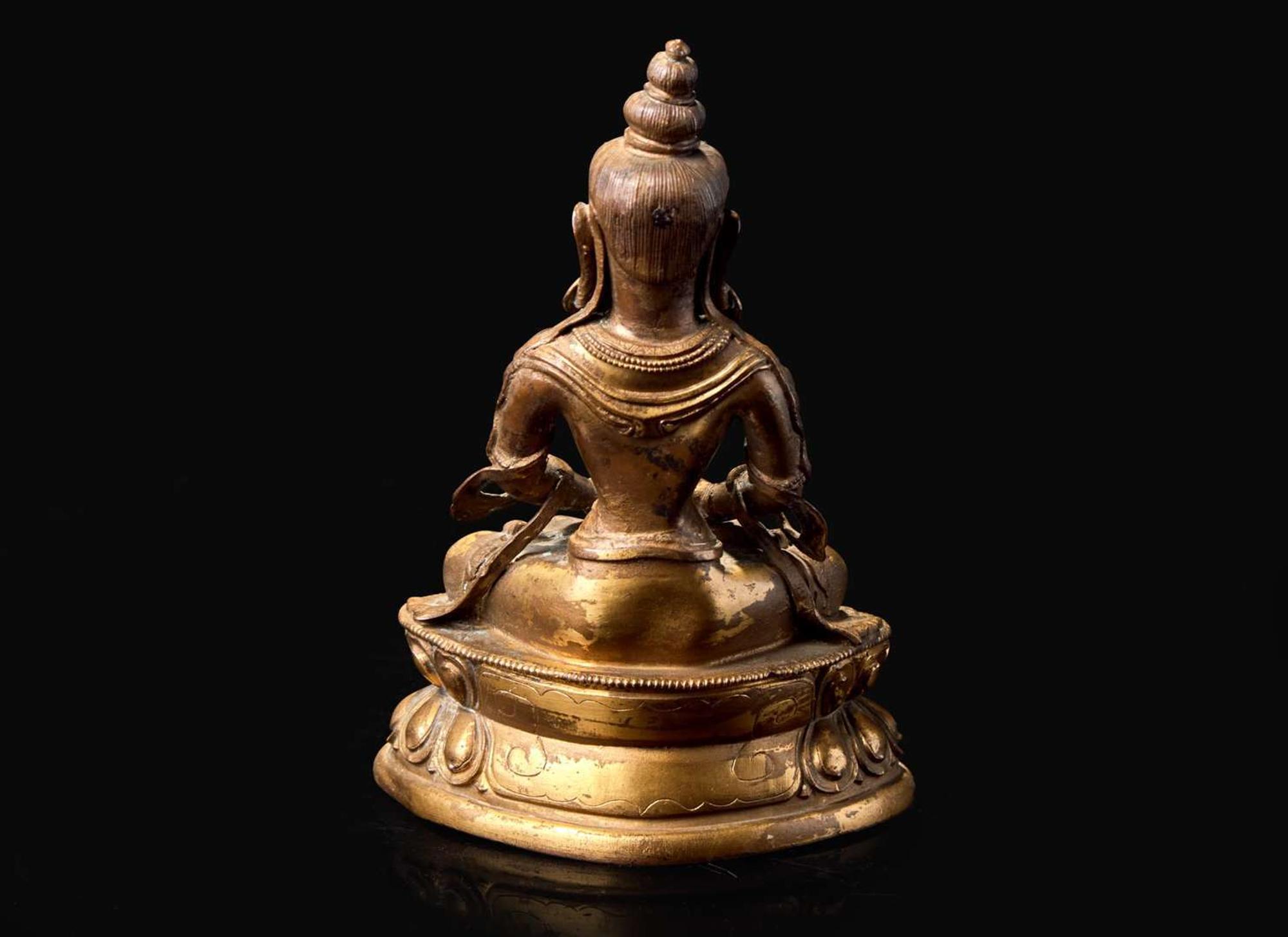 A Chinese gilt bronze figure of a meditating Bodhisattva, Qing dynasty 鎏金佛像 清