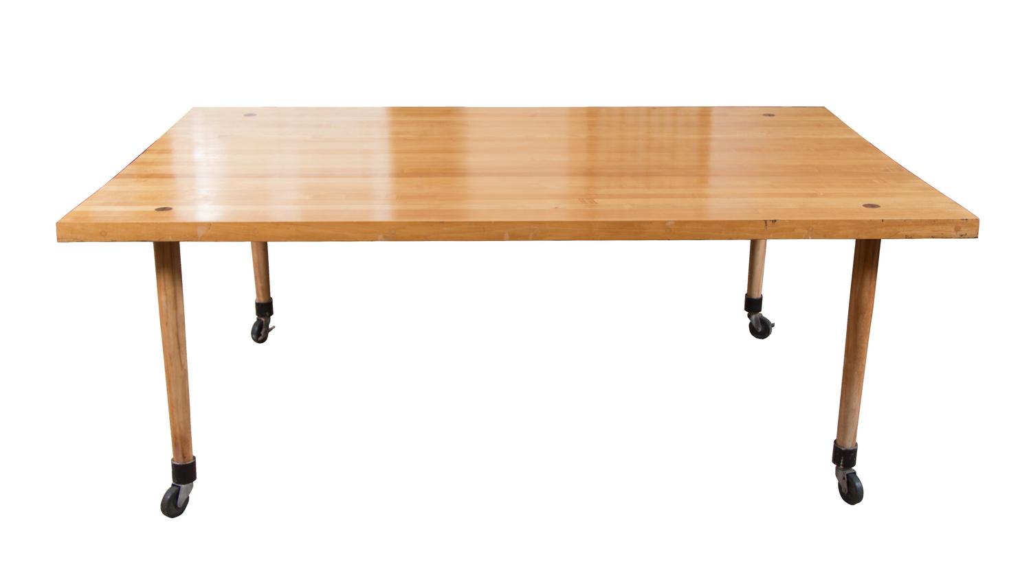 A Mid-Century Butcher-Block Dining Table Height 29 x length 77 1/2 x width 48 inches.