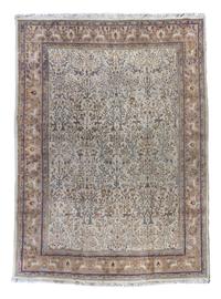 A Tabriz Wool Rug 13 feet 2 inches x 10 feet 2 inches.