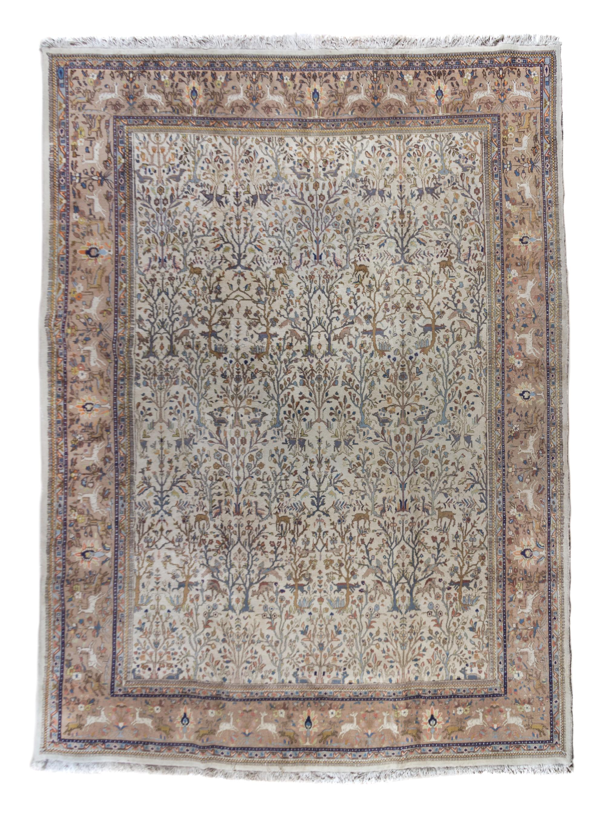 A Tabriz Wool Rug 13 feet 2 inches x 10 feet 2 inches.