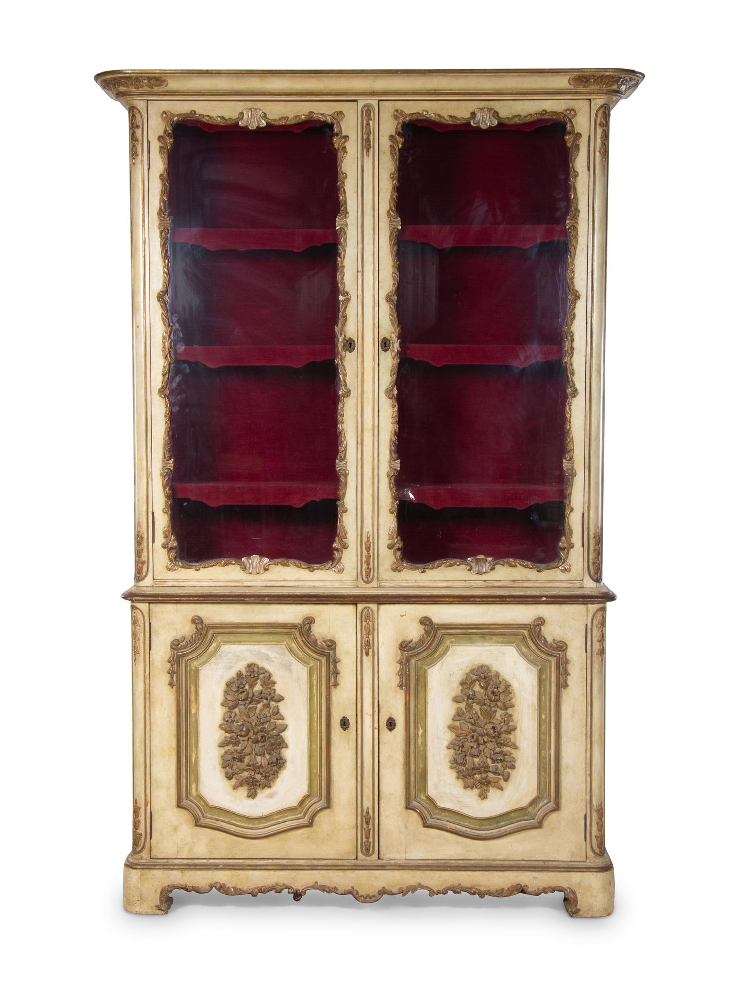 A Venetian Style Painted and Parcel Gilt Bookcase