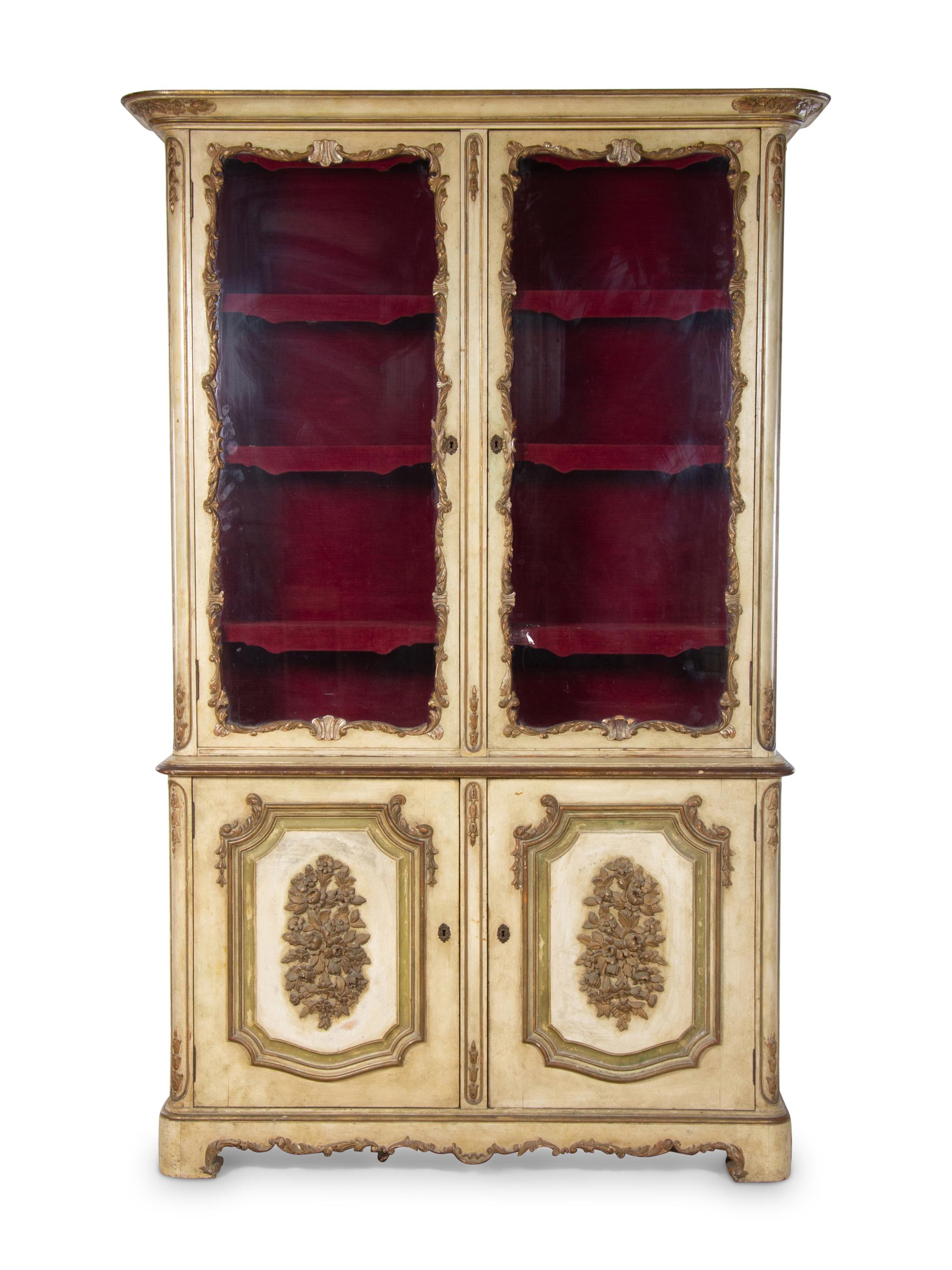 A Venetian Style Painted and Parcel Gilt Bookcase