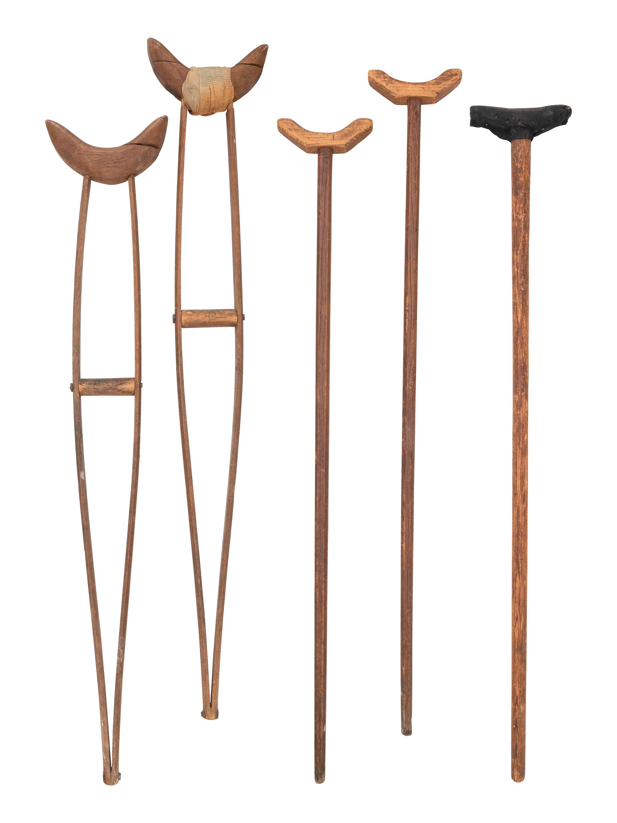 [MILITARIA - MEDICAL]. Medical tools and aids, incl. pair of Civil War-period crutches and brace.
