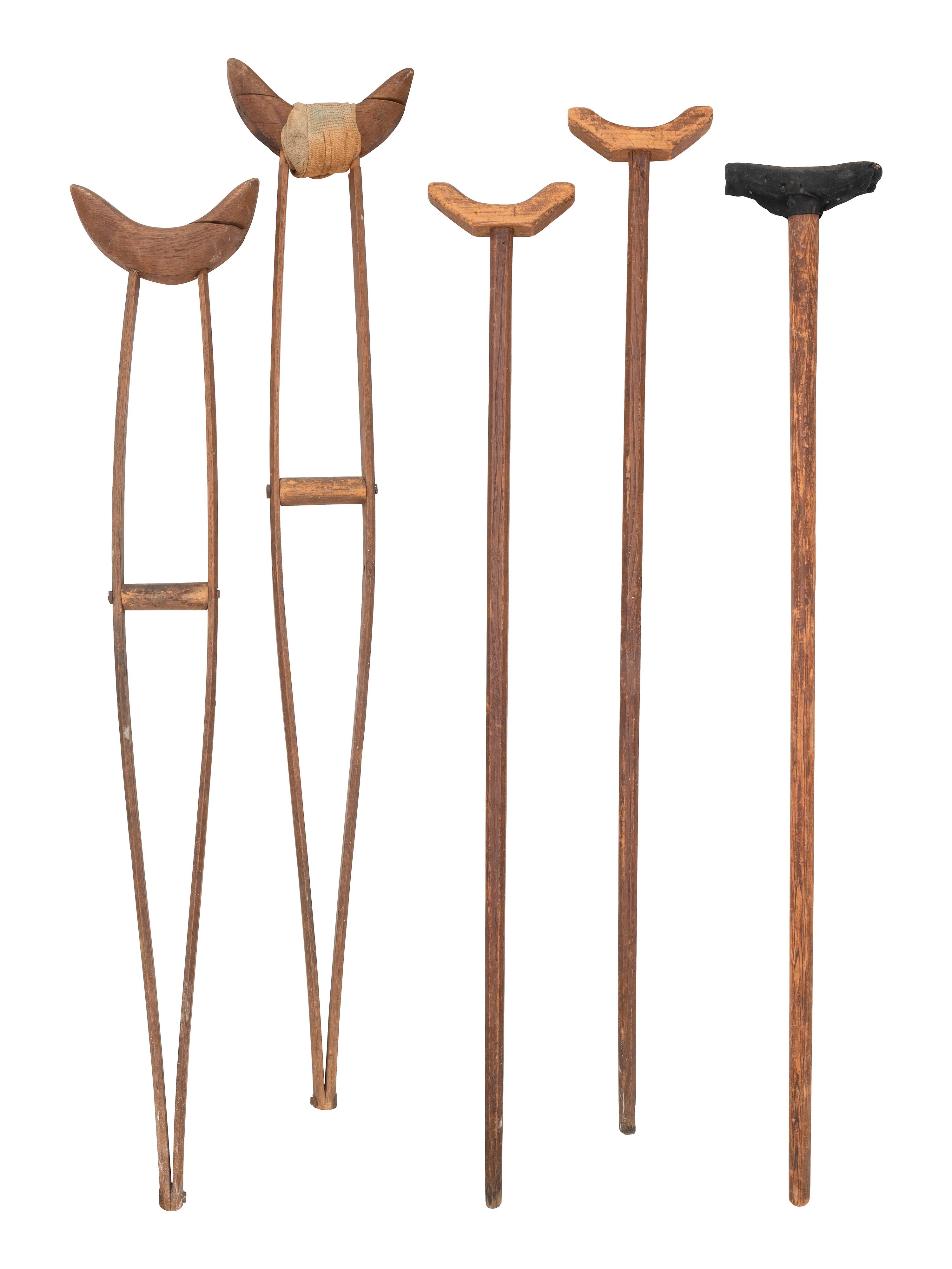 [MILITARIA - MEDICAL]. Medical tools and aids, incl. pair of Civil War-period crutches and brace.