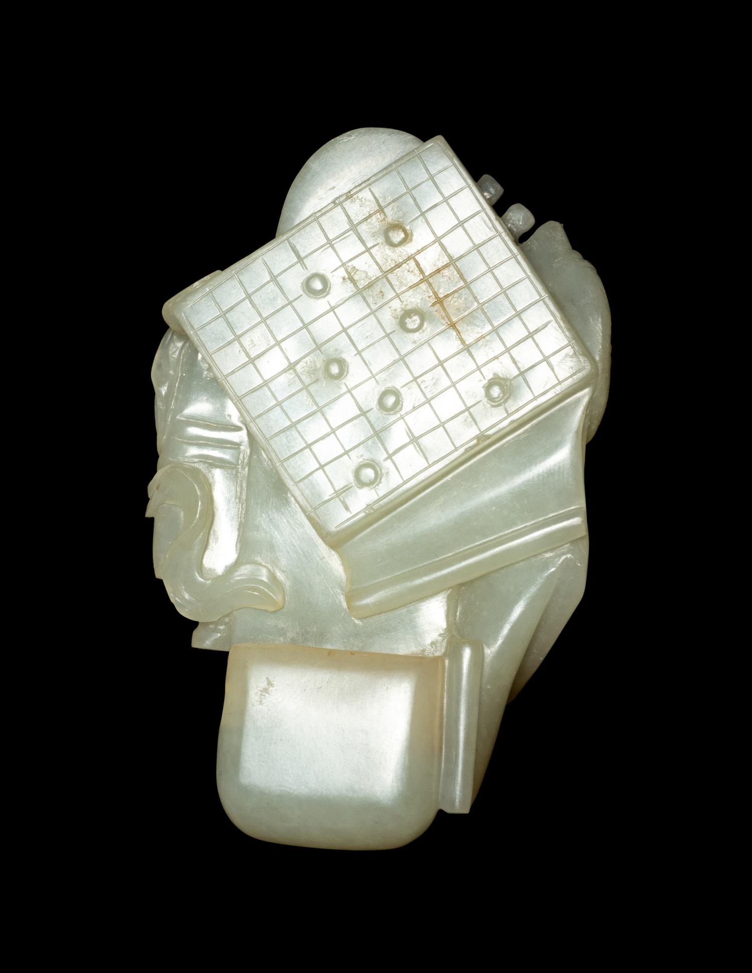 A Pale Celadon Jade 'Four Accomplishments' Carving