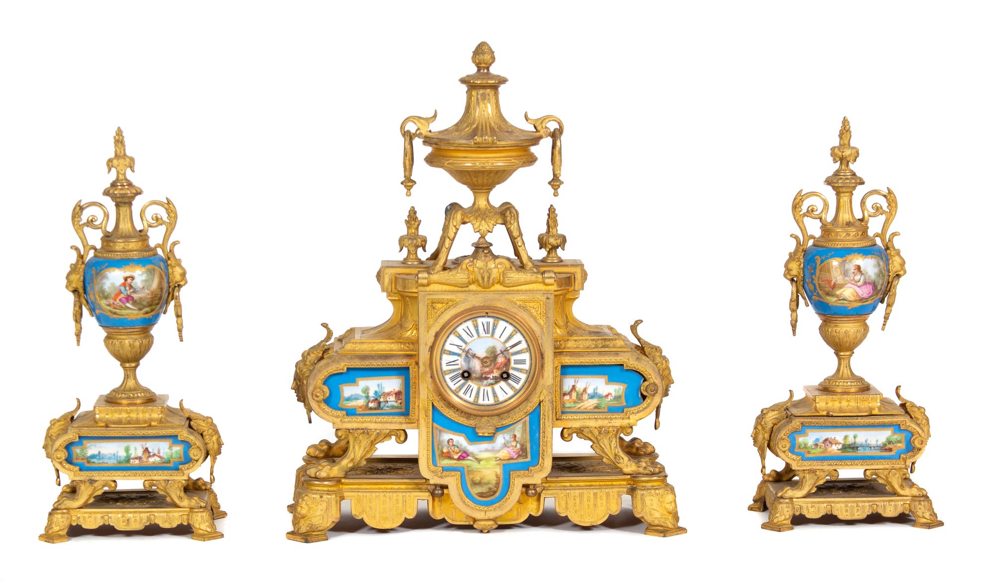 A Sevres Style Porcelain Mounted Gilt Bronze Three-Piece Clock Garniture Height of clock 19 inches. — PHILLIPE H. MOUREY, PARIS, 19TH CENTURY
