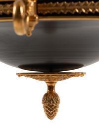 An Empire Style Gilt Bronze Twelve-Light Chandelier