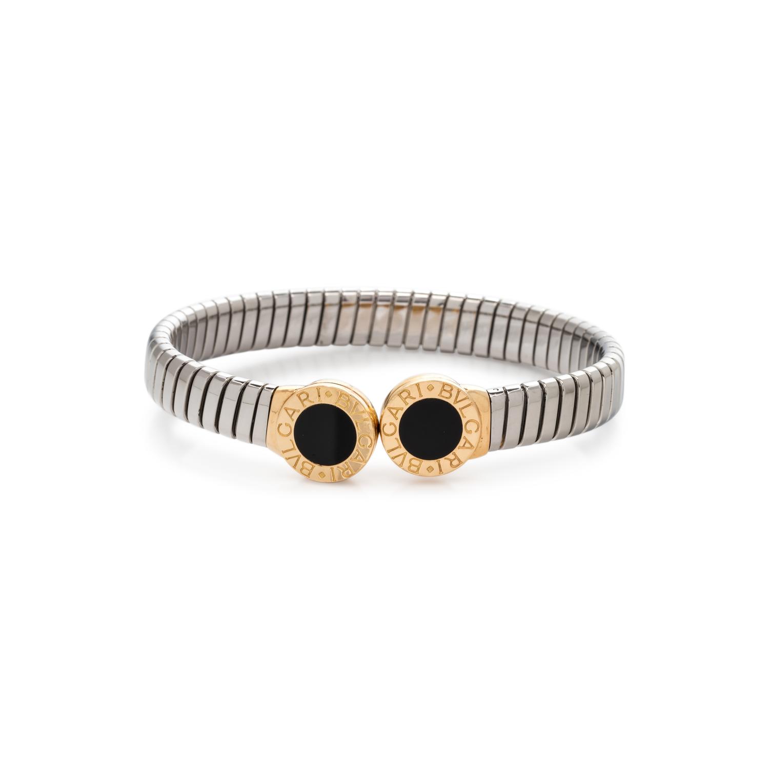 BVLGARI, STEEL, YELLOW GOLD AND ONYX 'TUBOGAS' CUFF BRACELET