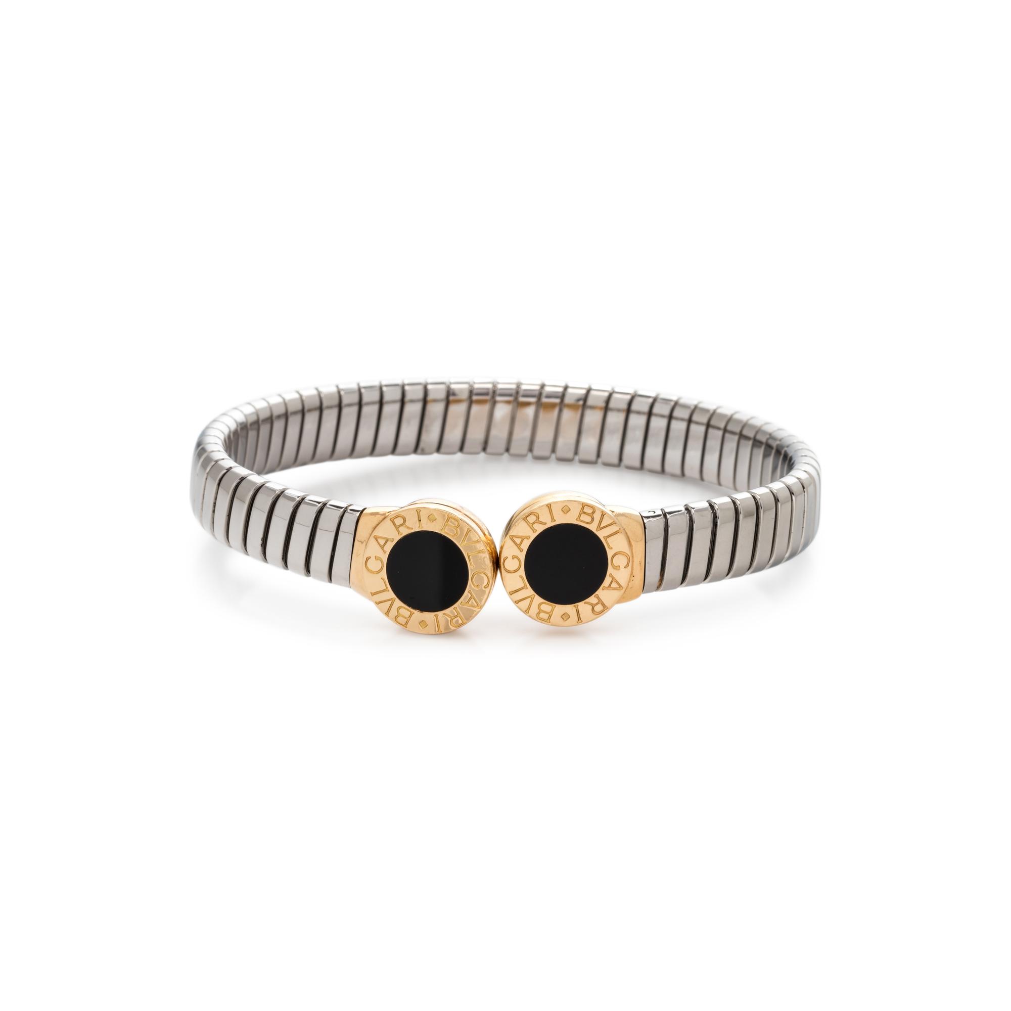BVLGARI, STEEL, YELLOW GOLD AND ONYX 'TUBOGAS' CUFF BRACELET