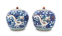 A Pair of Blue Ground Iron Red and Green Decorated Porcelain Ginger Jars and Covers Height of each 9 3/8 inches. — 19TH CENTURY