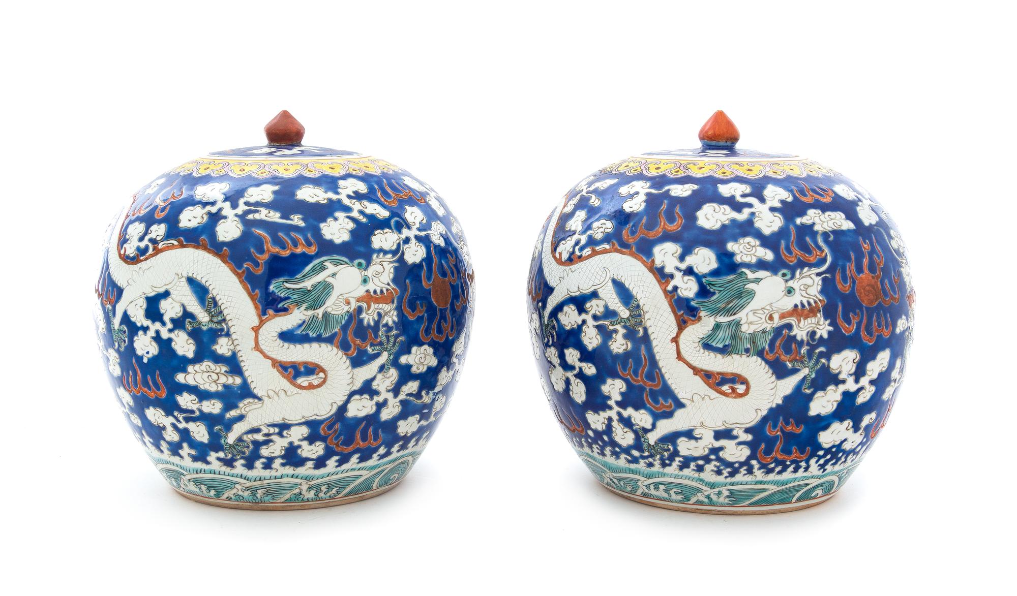 A Pair of Blue Ground Iron Red and Green Decorated Porcelain Ginger Jars and Covers Height of each 9 3/8 inches. — 19TH CENTURY