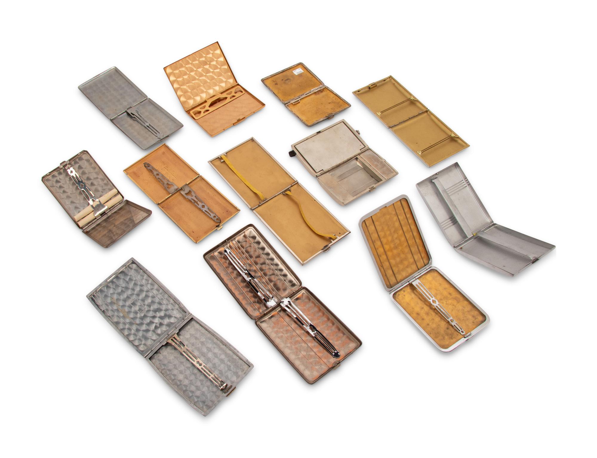 A Group of Twelve Art Deco Enamel Cigarette Cases