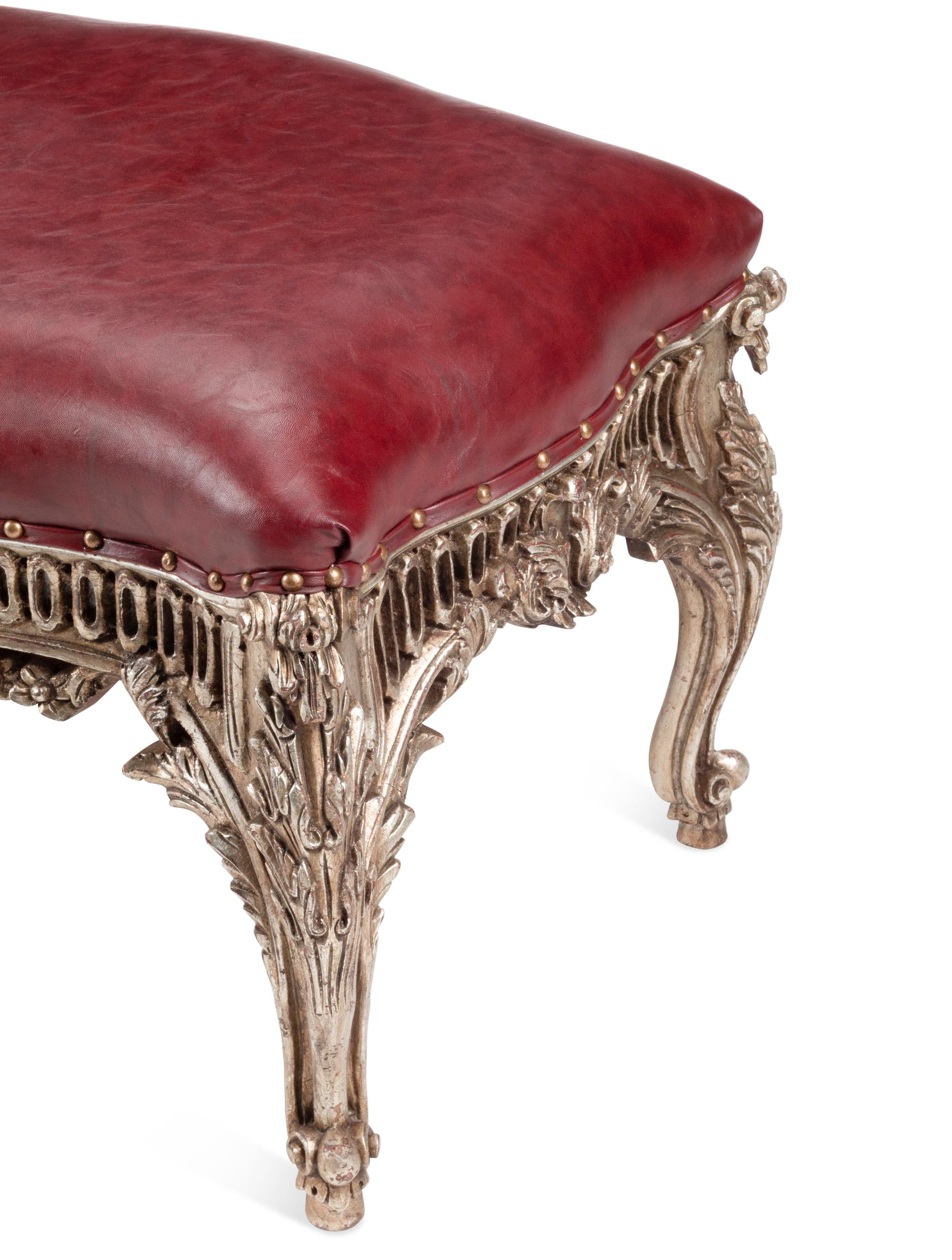A Pair of Régence Style Silvered Benches with Leather Upholstery