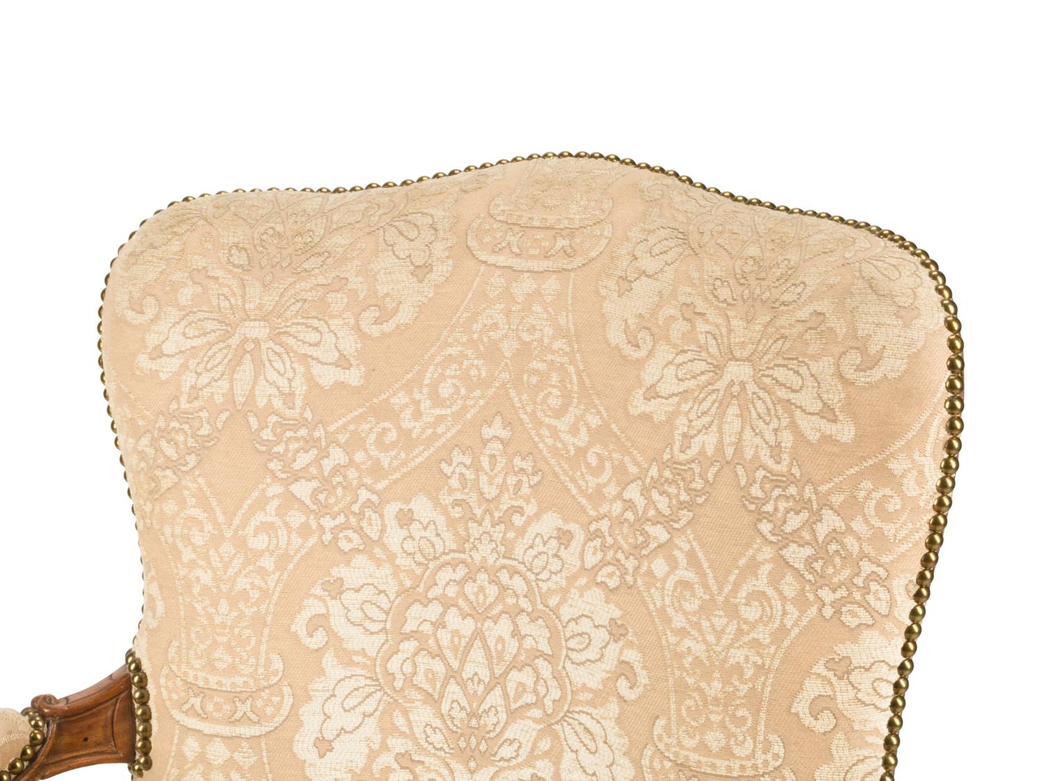 An Italian Carved Walnut Armchair