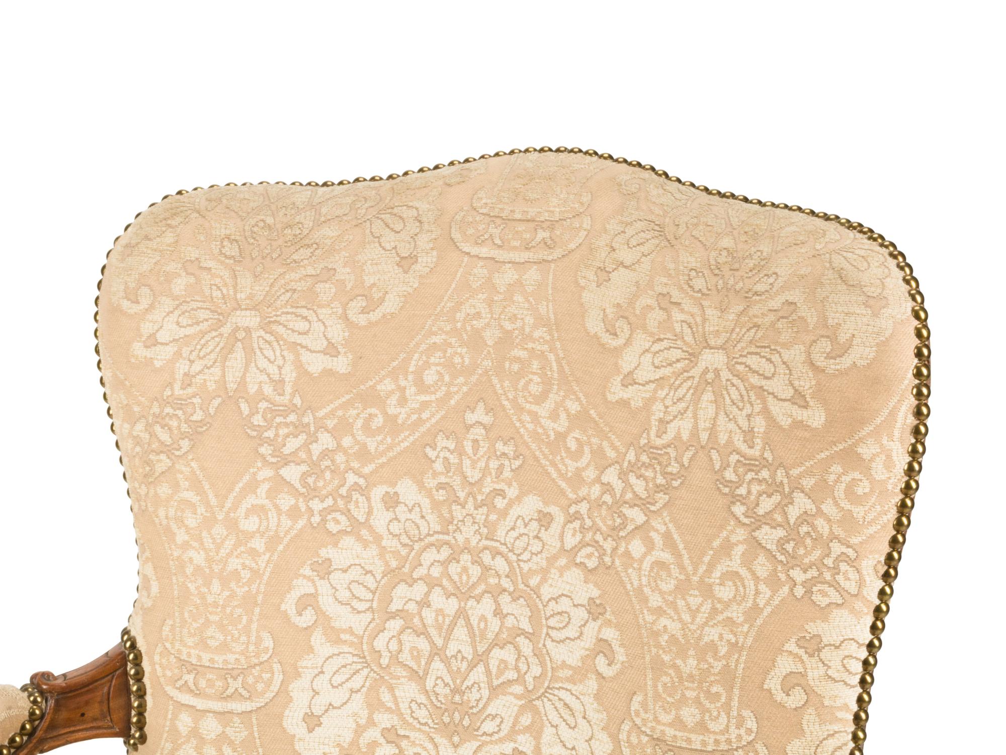 An Italian Carved Walnut Armchair