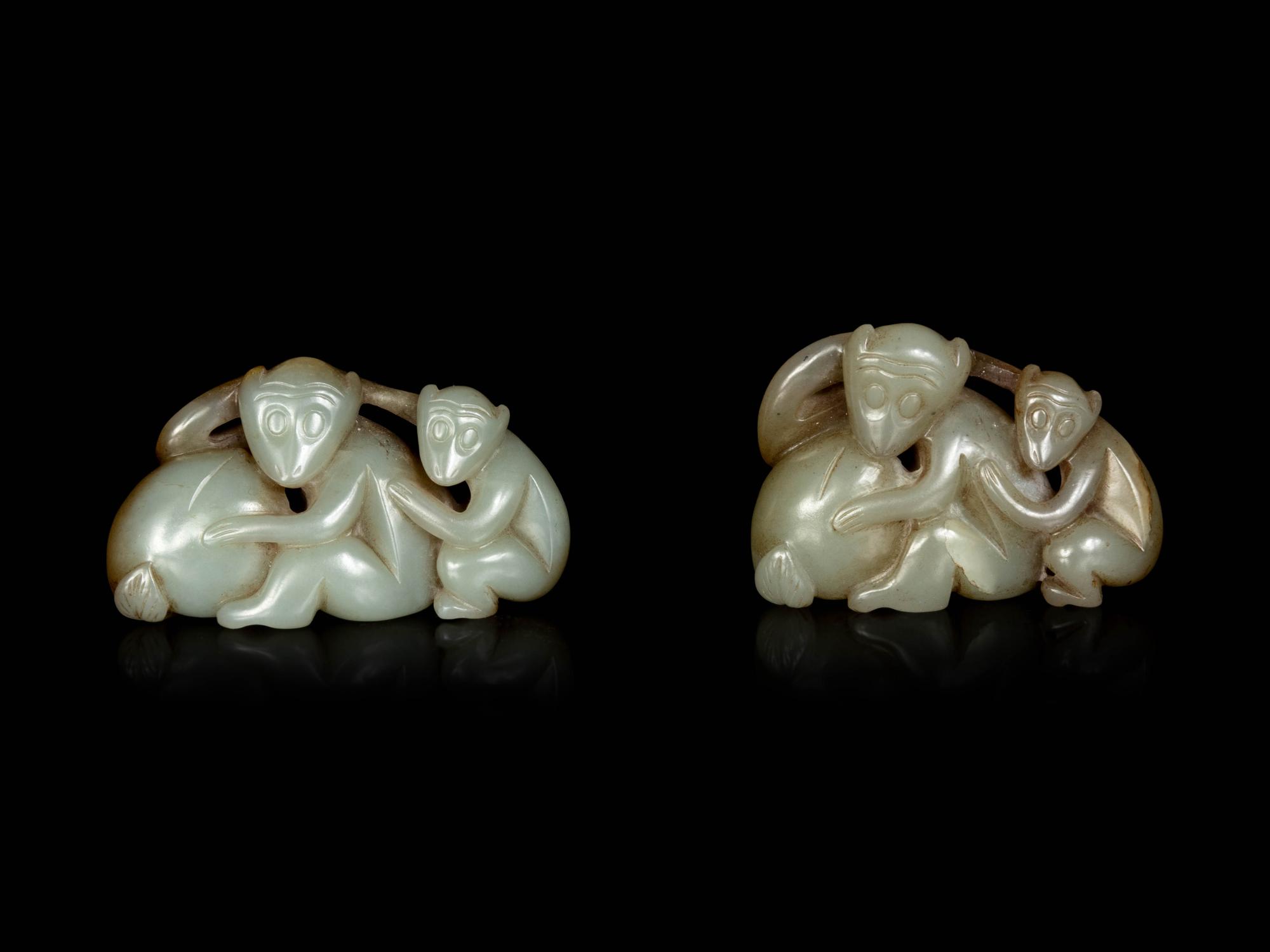 Two Chinese Celadon and Russet Jade Carved Figures of Monkeys