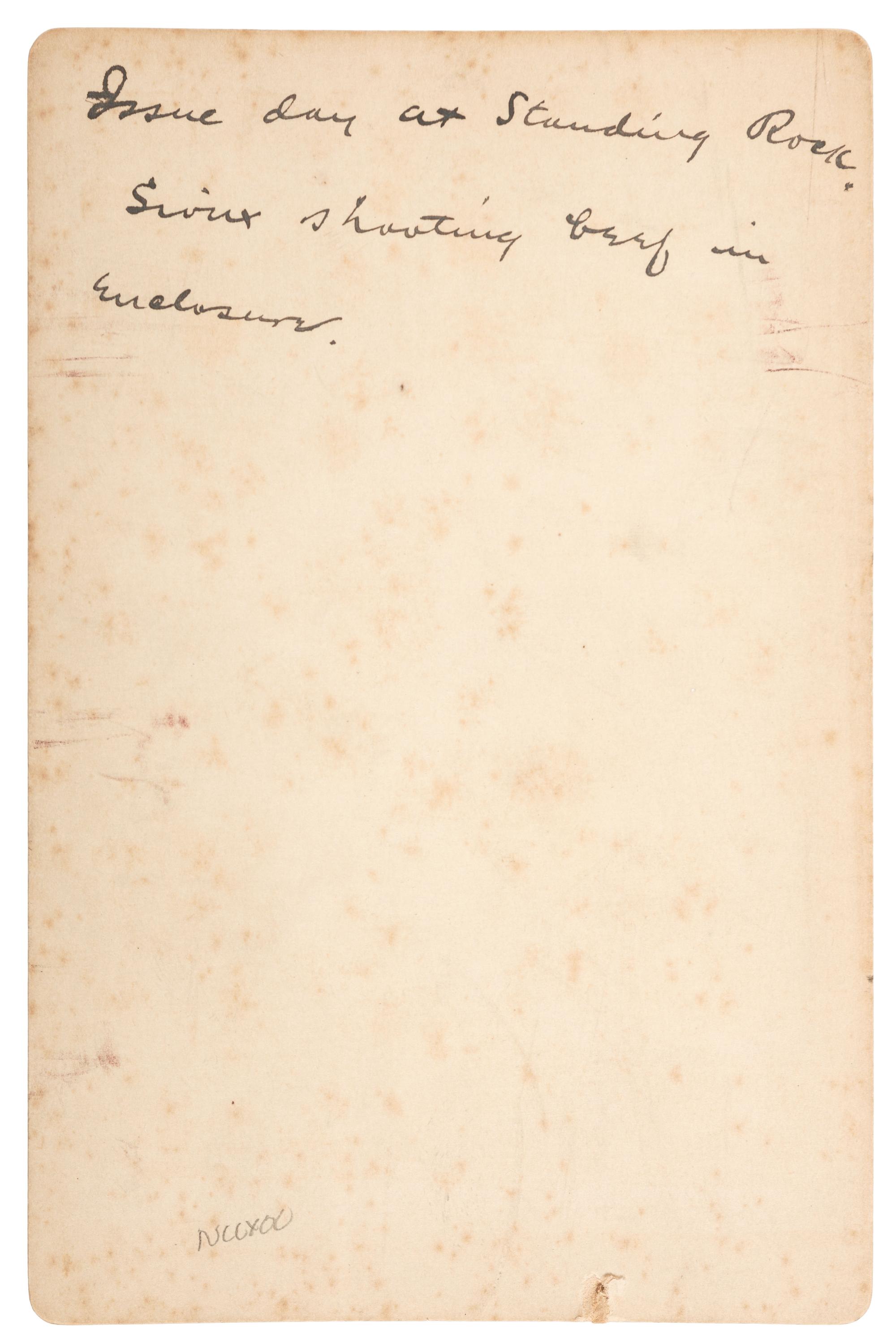 [NATIVE AMERICANS]. SAWYERS & CONNOLLEY, photographers. Shooting Government Issue Beef. Standing Rock Reservation. Purcell, Indian Territory [Oklahoma]: ca 1880.