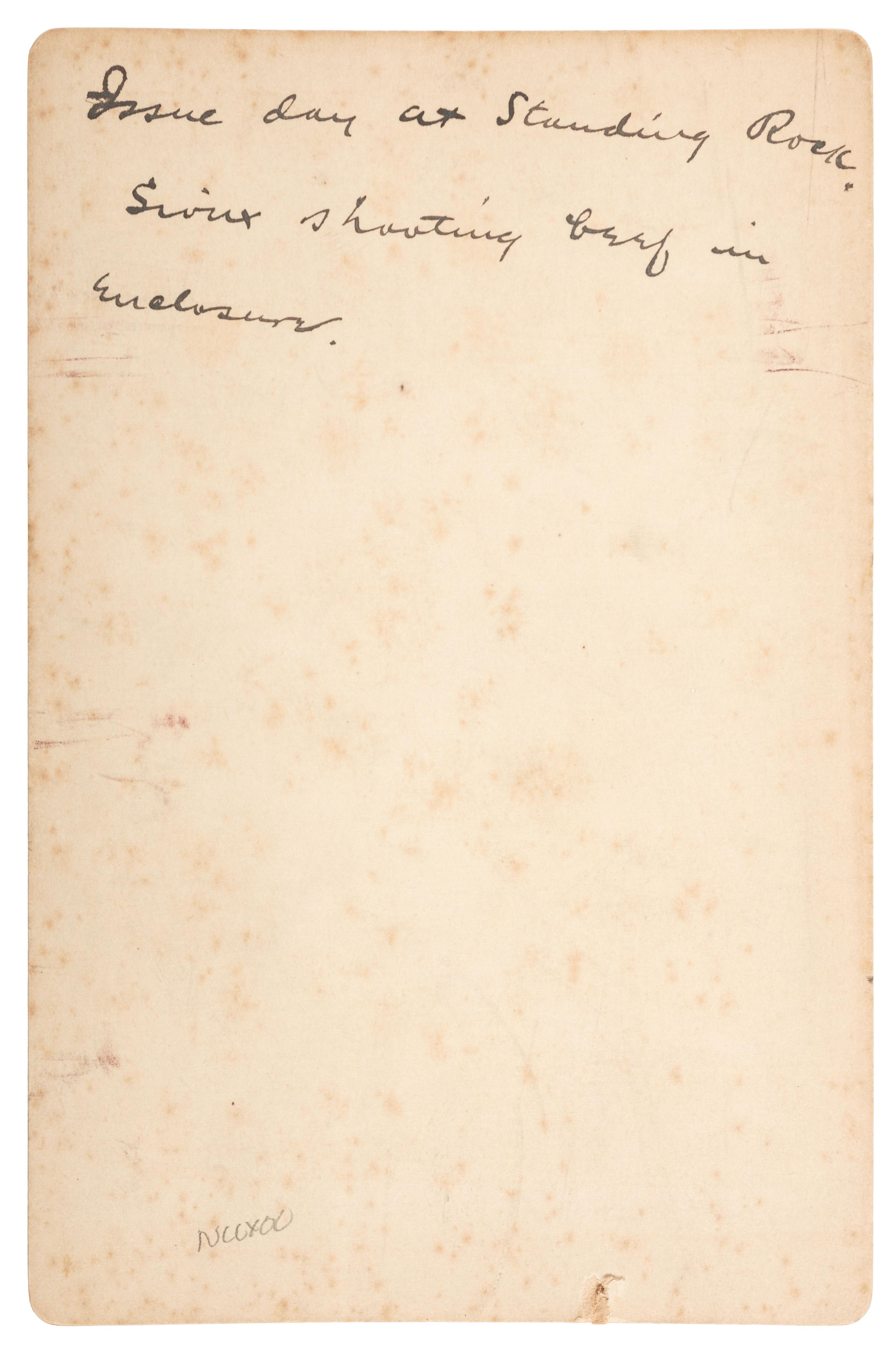 [NATIVE AMERICANS]. SAWYERS & CONNOLLEY, photographers. Shooting Government Issue Beef. Standing Rock Reservation. Purcell, Indian Territory [Oklahoma]: ca 1880.