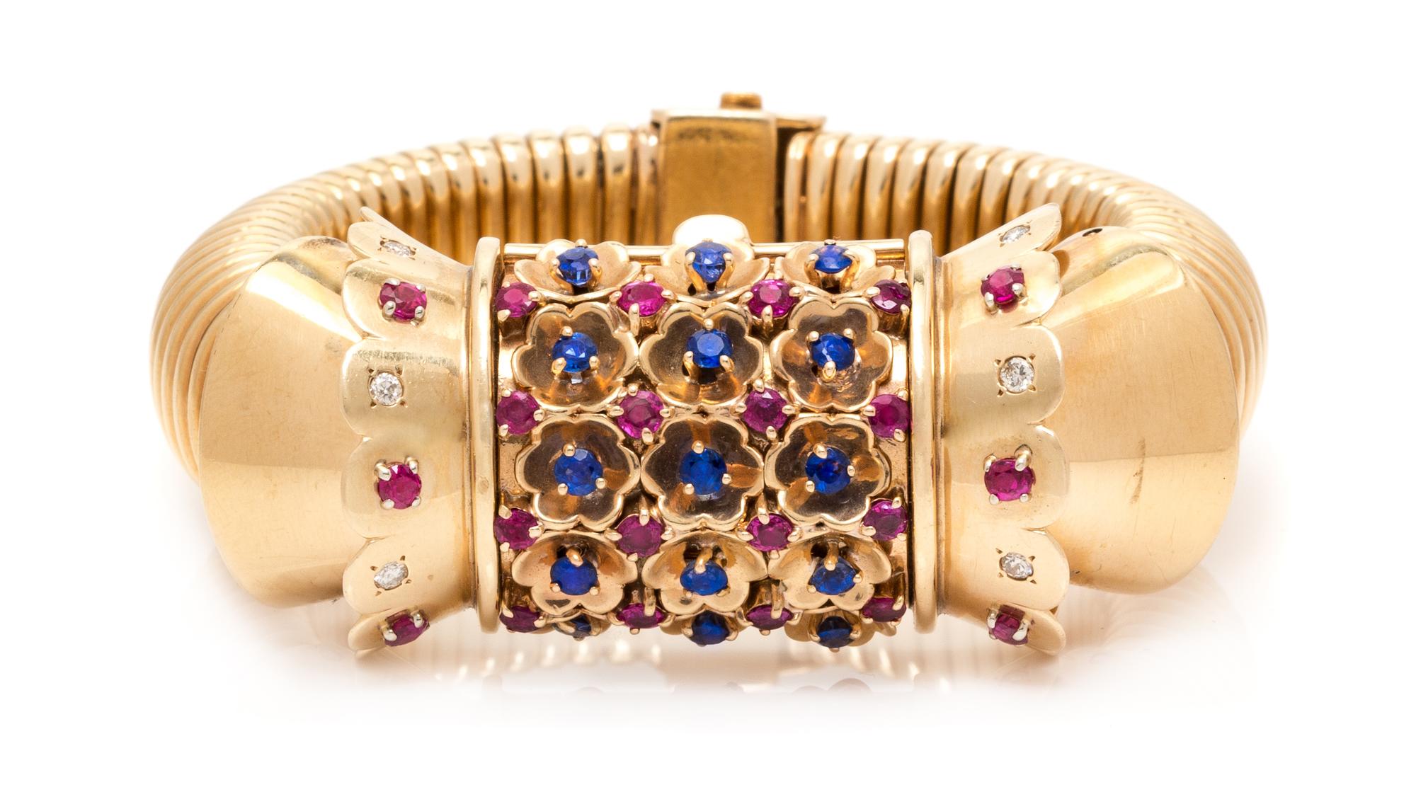 A Retro Rose Gold, Ruby, Sapphire and Diamond Surprise Wristwatch, John Rubel for Cartier, 71.60 dwts.